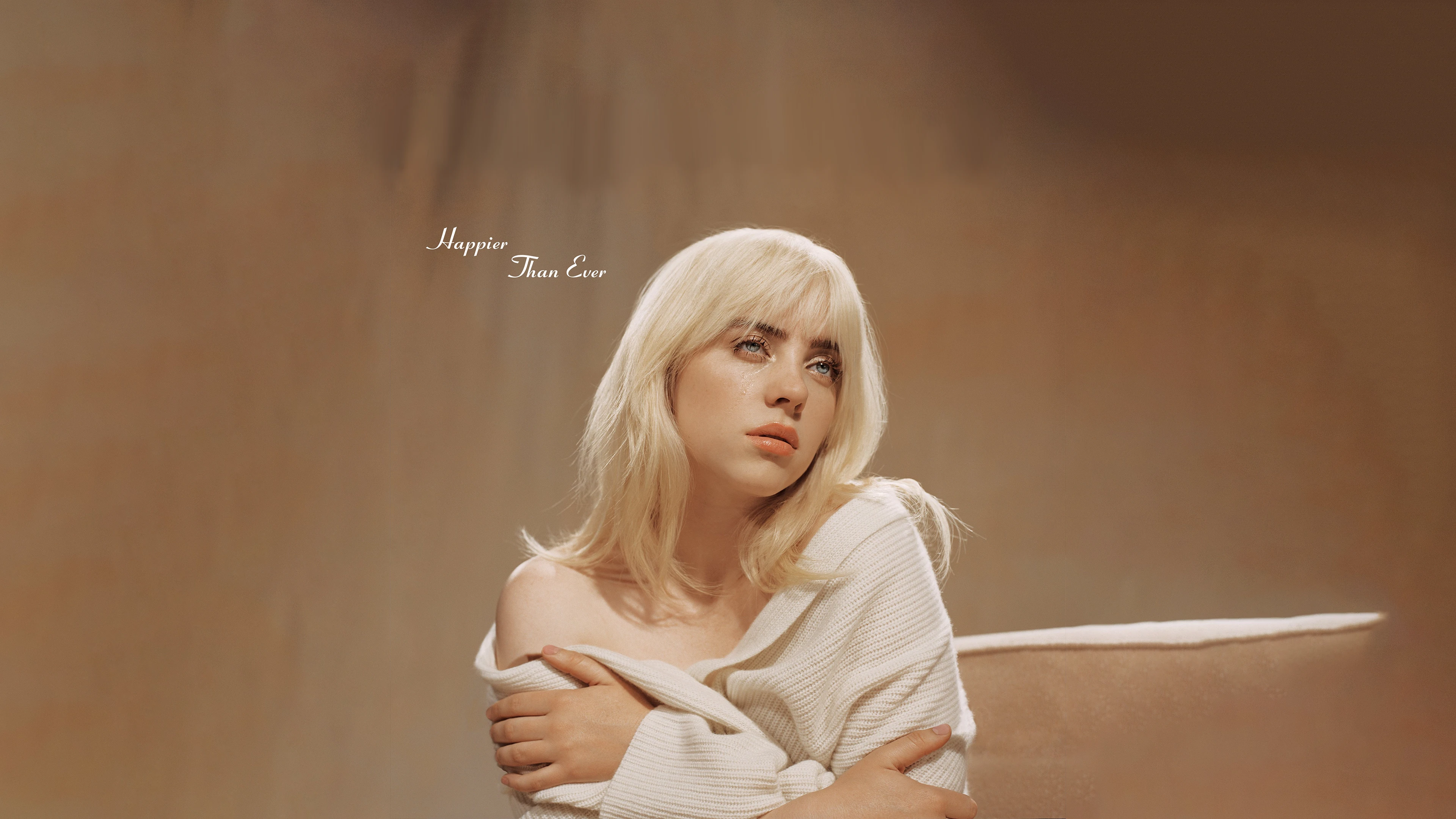 Critiquing Albums Like I Could Make Anything Better: Happier Than Ever By Billie Eilish 8 Blonde Person In A Light Sweater Sits In A Beige Setting With &Quot;Happier Than Ever&Quot; Text.