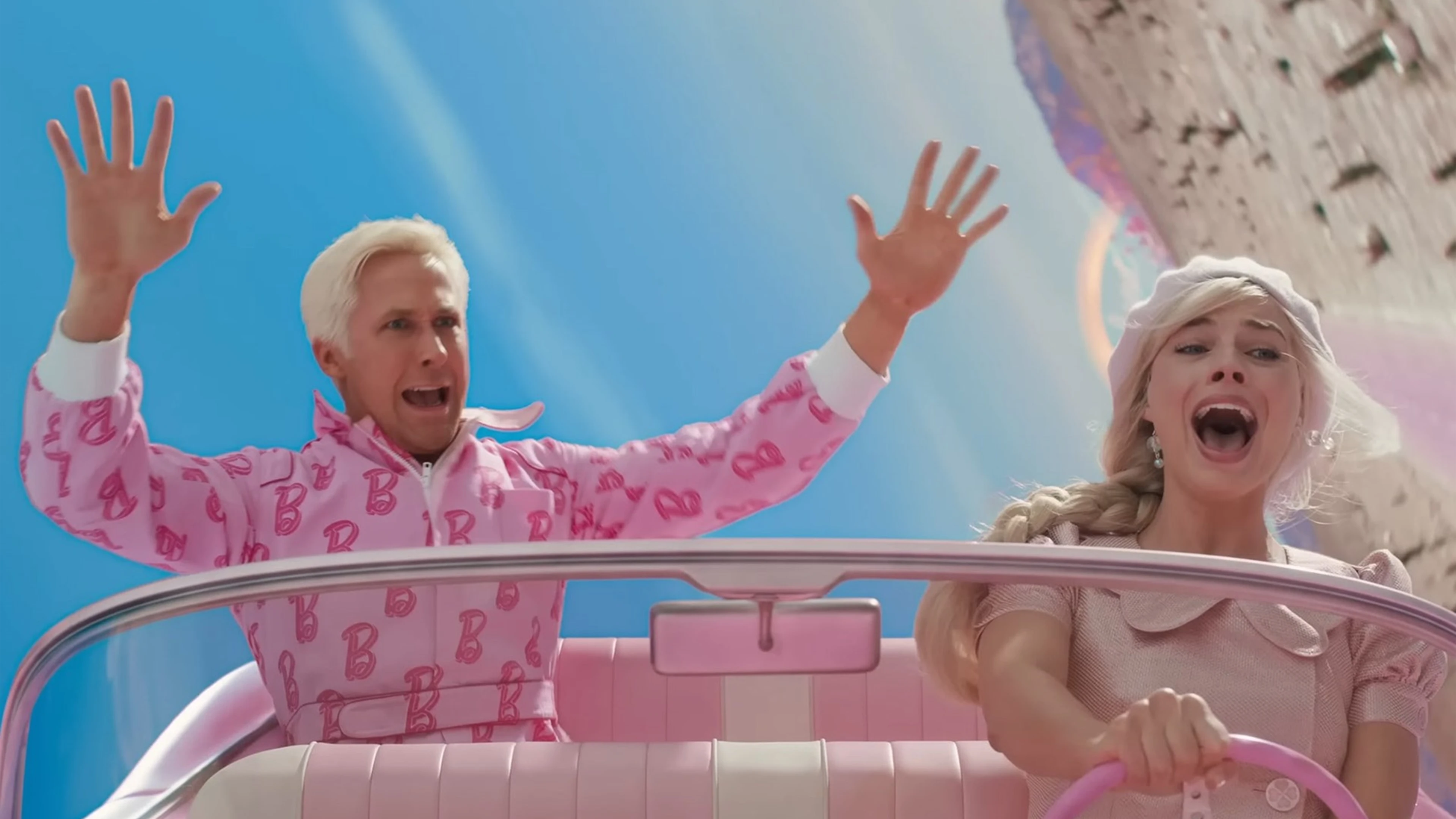 My Highly Anticipated Analysis Of Greta Gerwig'S Barbie! 7 Two People In Pink Outfits In A Convertible; One Raises Hands, The Other Drives Joyfully, Blue Sky.