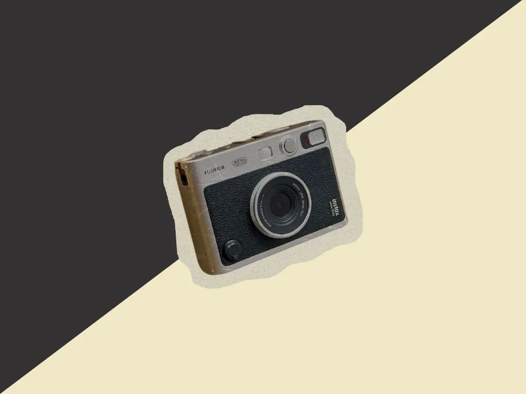 The Reality Of Being A Photographer: 3 Pros And 3 Cons 2 Fujifilm Instax Instant Camera With Black And Beige Design On A Split Dark Gray And Beige Background